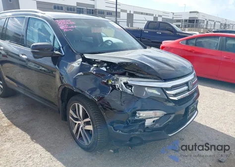 2017 Honda Pilot Touring z USA, uszkodzony, nr VIN 5FNYF6H90HB096460